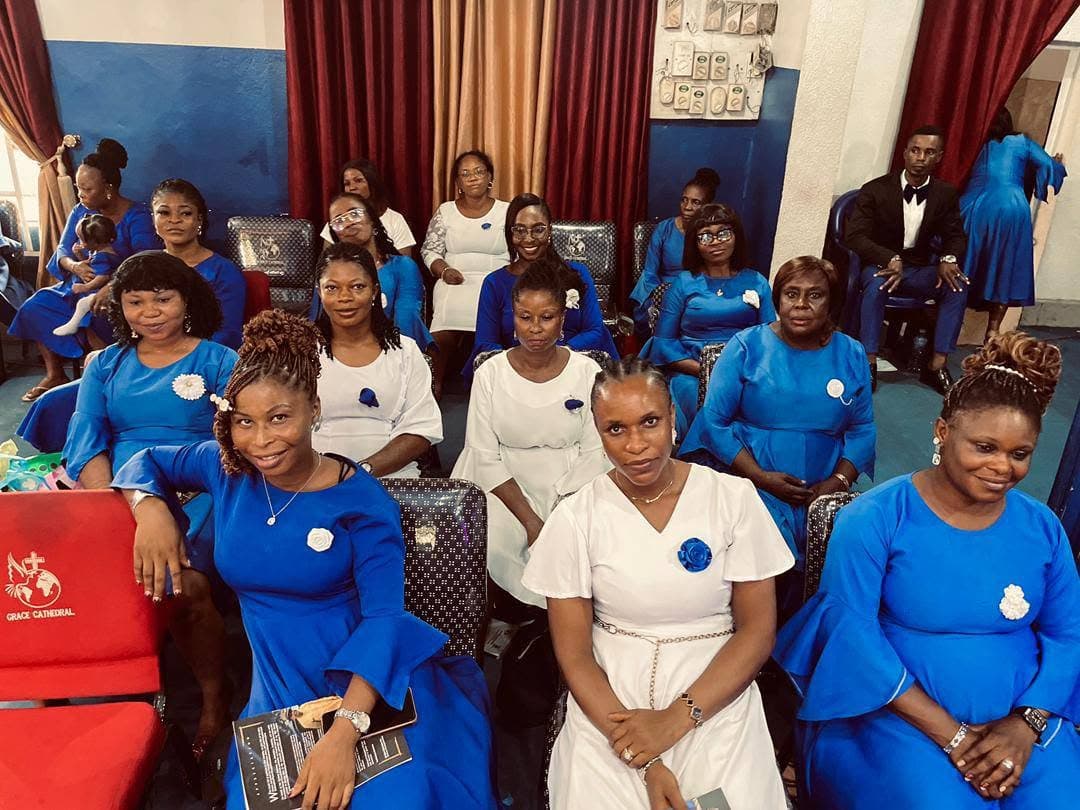 Members in blue and white gathered for the 30th anniversary celebration