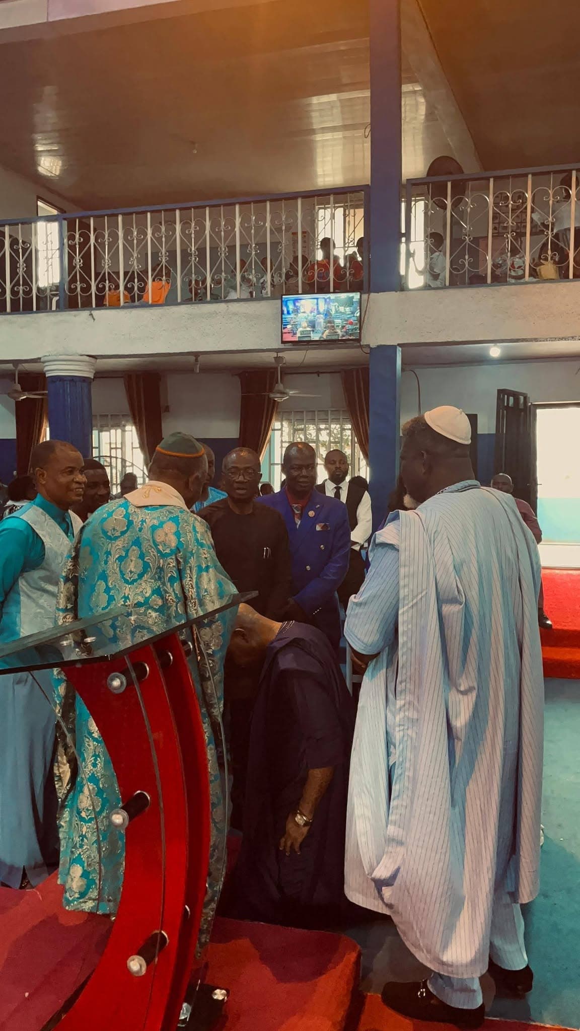 Guests being welcomed at the 30th anniversary service