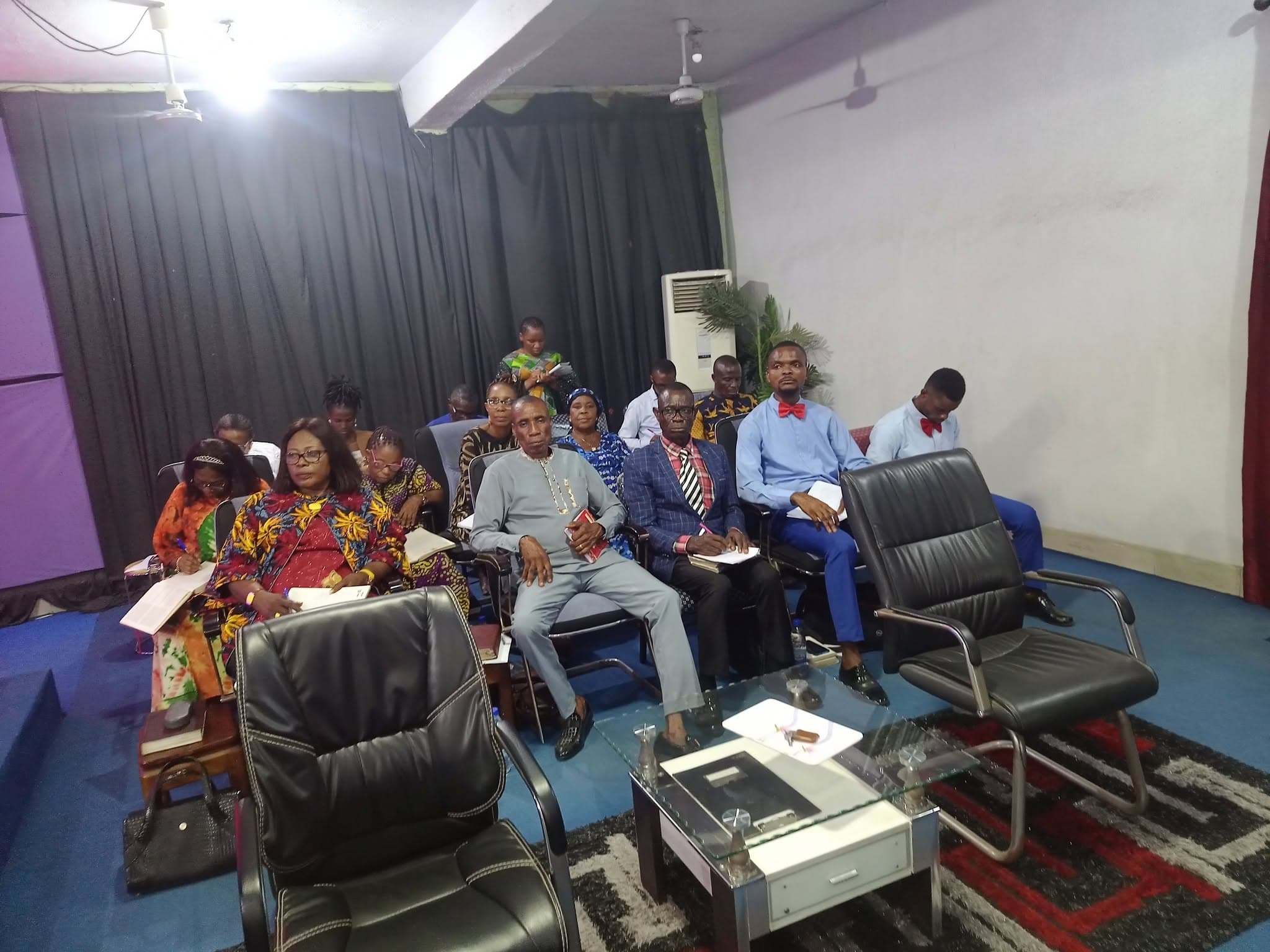 Church leaders seated together during a meeting